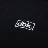 Black athletic tank fabric with embroidered dbk logo patch