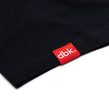 Black athletic tank hem with red dbk brand label