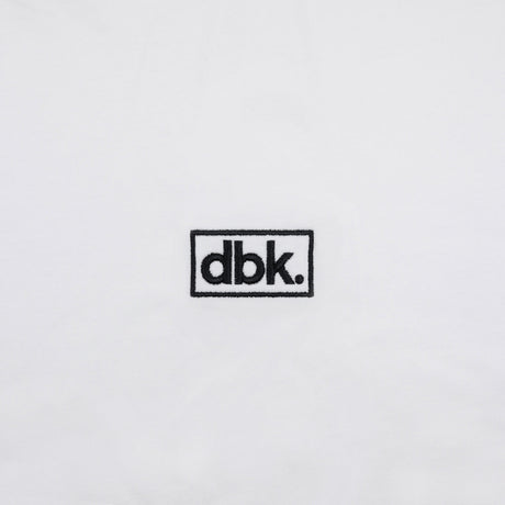 White athletic tank fabric with small dbk rectangular logo patch