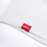 White athletic tank hem with red dbk brand label