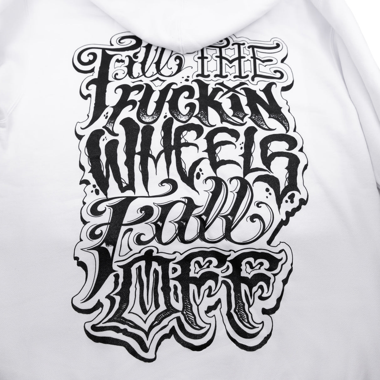 White hoodie close-up of large front graphic print in bold lettering.