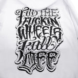 White hoodie close-up of large front graphic print in bold lettering.