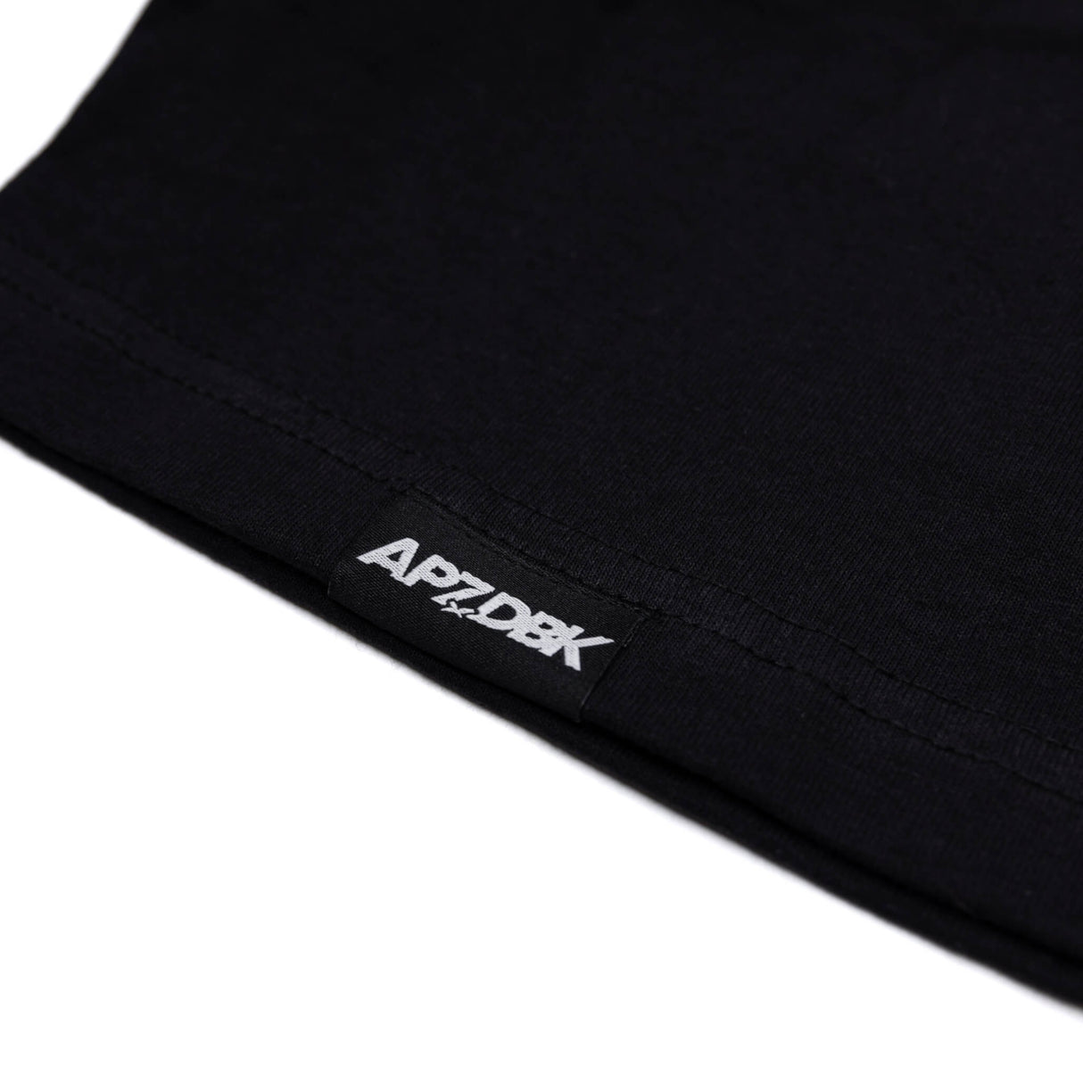 Black crewneck tee hem with APZD8K logo label