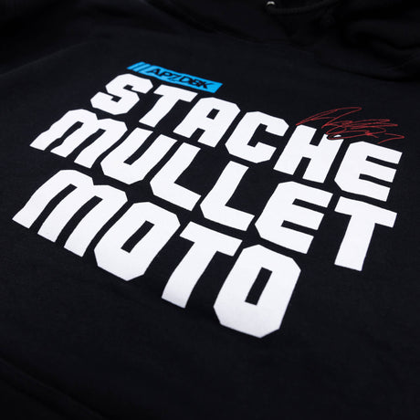 Youth black hoodie close-up of front graphic text and small red accents