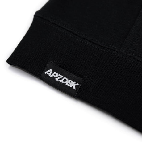 Youth black hoodie sleeve cuff with AP7DBK logo label