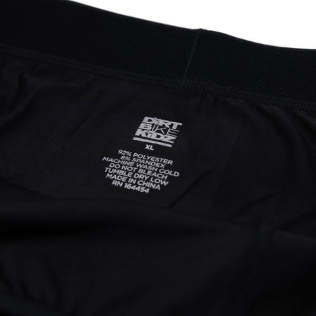 Black boxer briefs care label and size text inside waistband