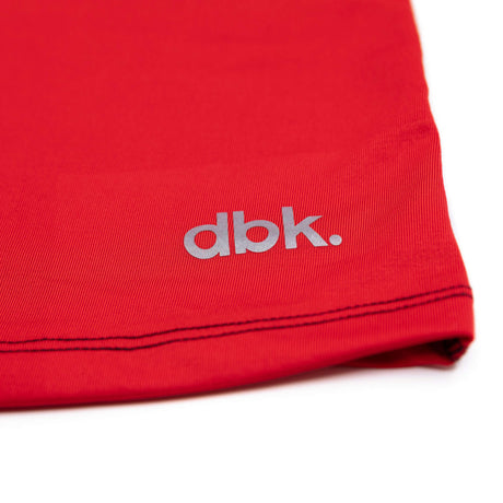Red boxer briefs close-up of dbk logo on the hem