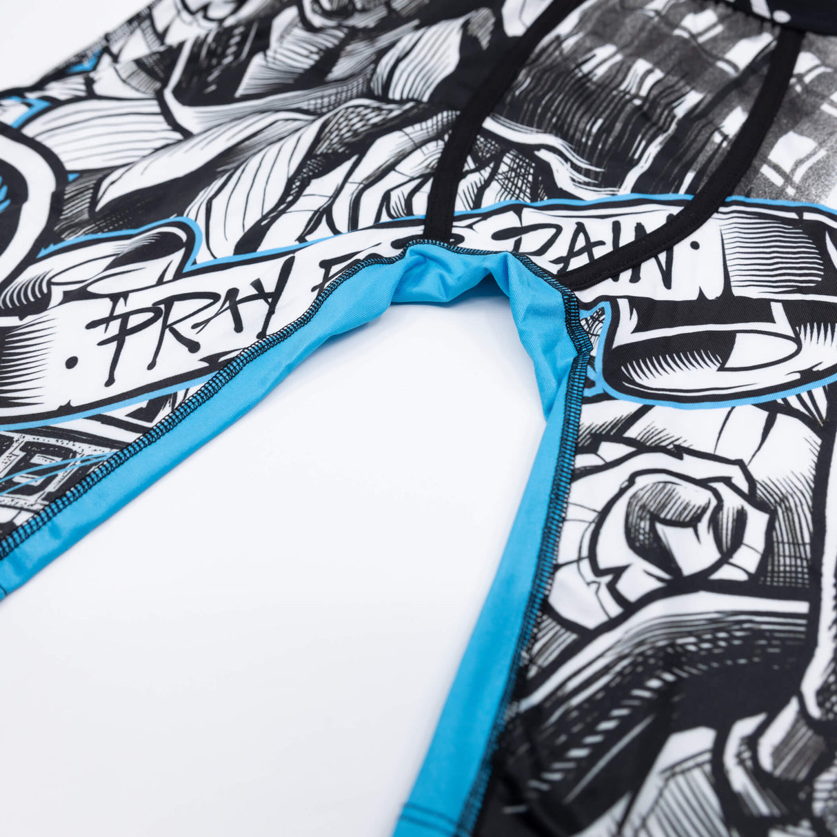 Boys boxer briefs close-up of blue-trimmed fly opening on black-and-white print