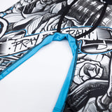 Boys boxer briefs close-up of blue-trimmed fly opening on black-and-white print