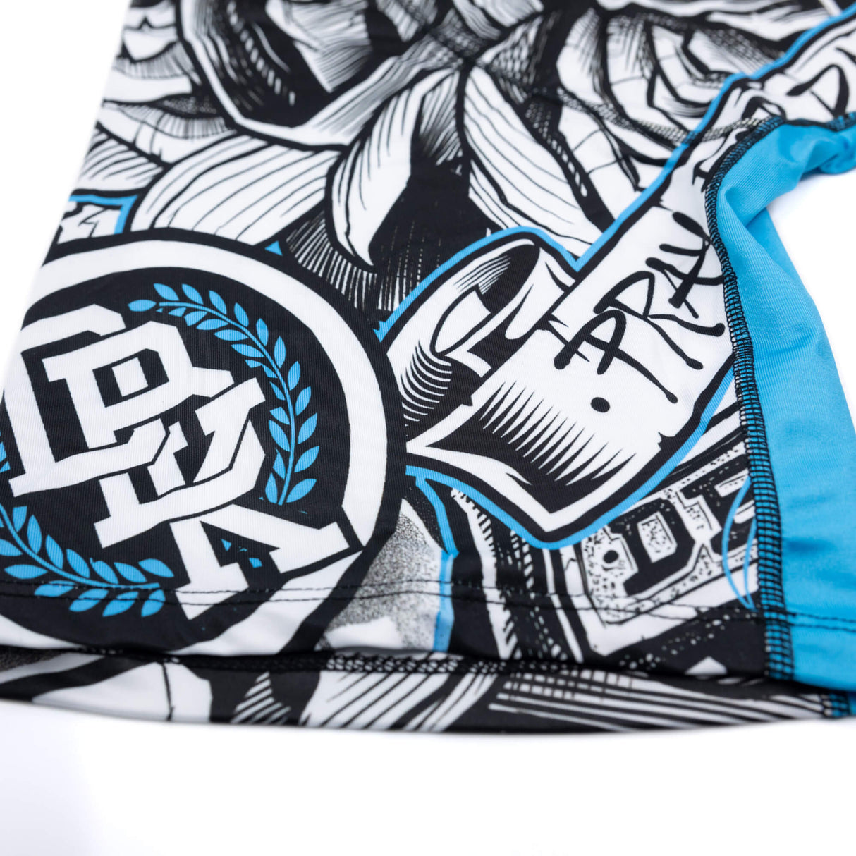Boys boxer briefs close-up: blue, white, black pattern with blue edge trim