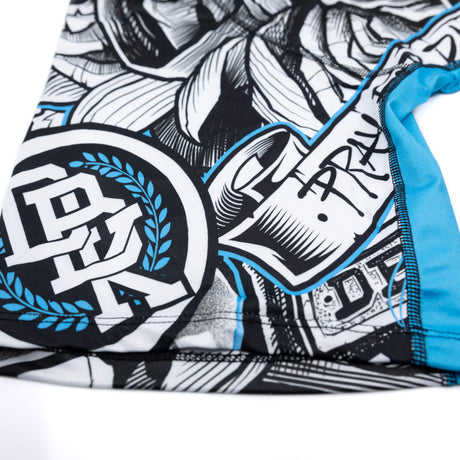 Detail view of black/white print with blue seam trim on boxer briefs fabric