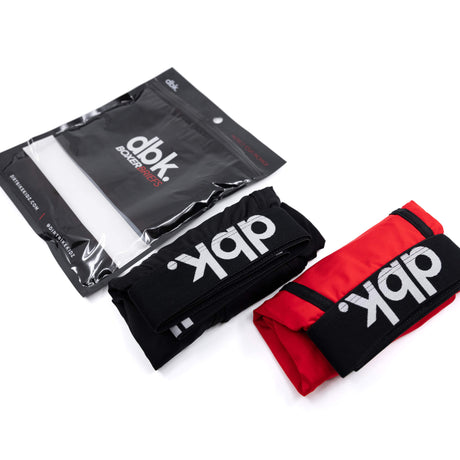 Folded 2-pack boxer briefs: black and red with dbk waistband logos