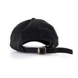 Black dad hat back view with adjustable strap and metal buckle