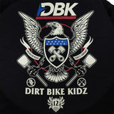 Black T-shirt close-up: DBK Dirt Bike Kidz eagle, stars, and crossed tools graphic.