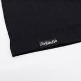 Youth black T-shirt hem with DintBikeRidz logo label