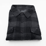 Charcoal plaid flannel button-up shirt with collar and chest flap pockets