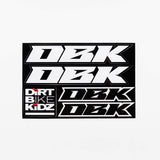 Rectangular sticker pack sheet with white racing numbers and 'DIRT BIKE KIDZ' logo on black