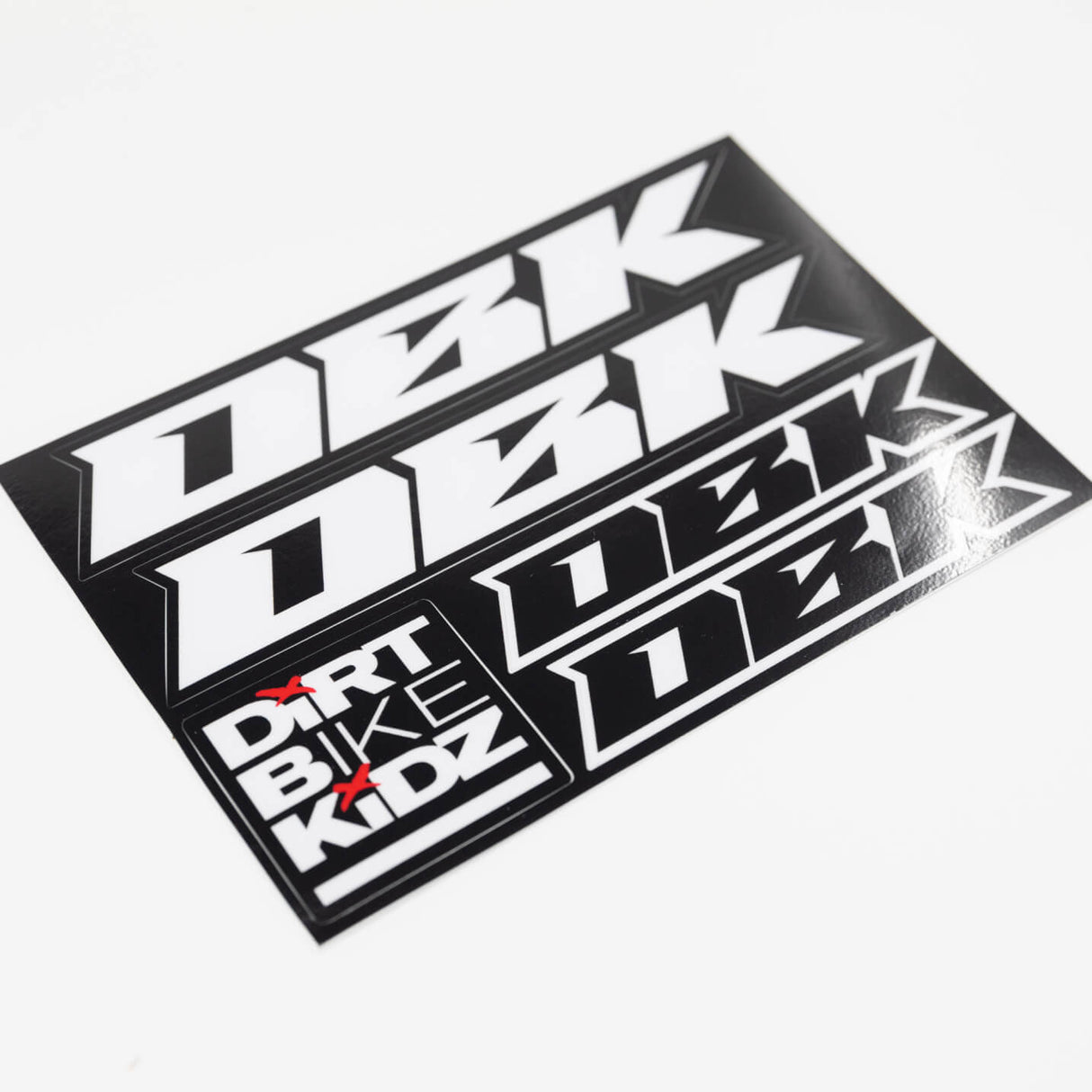 Close-up sticker pack with white racing number graphics and 'DIRT BIKE KIDZ' logo