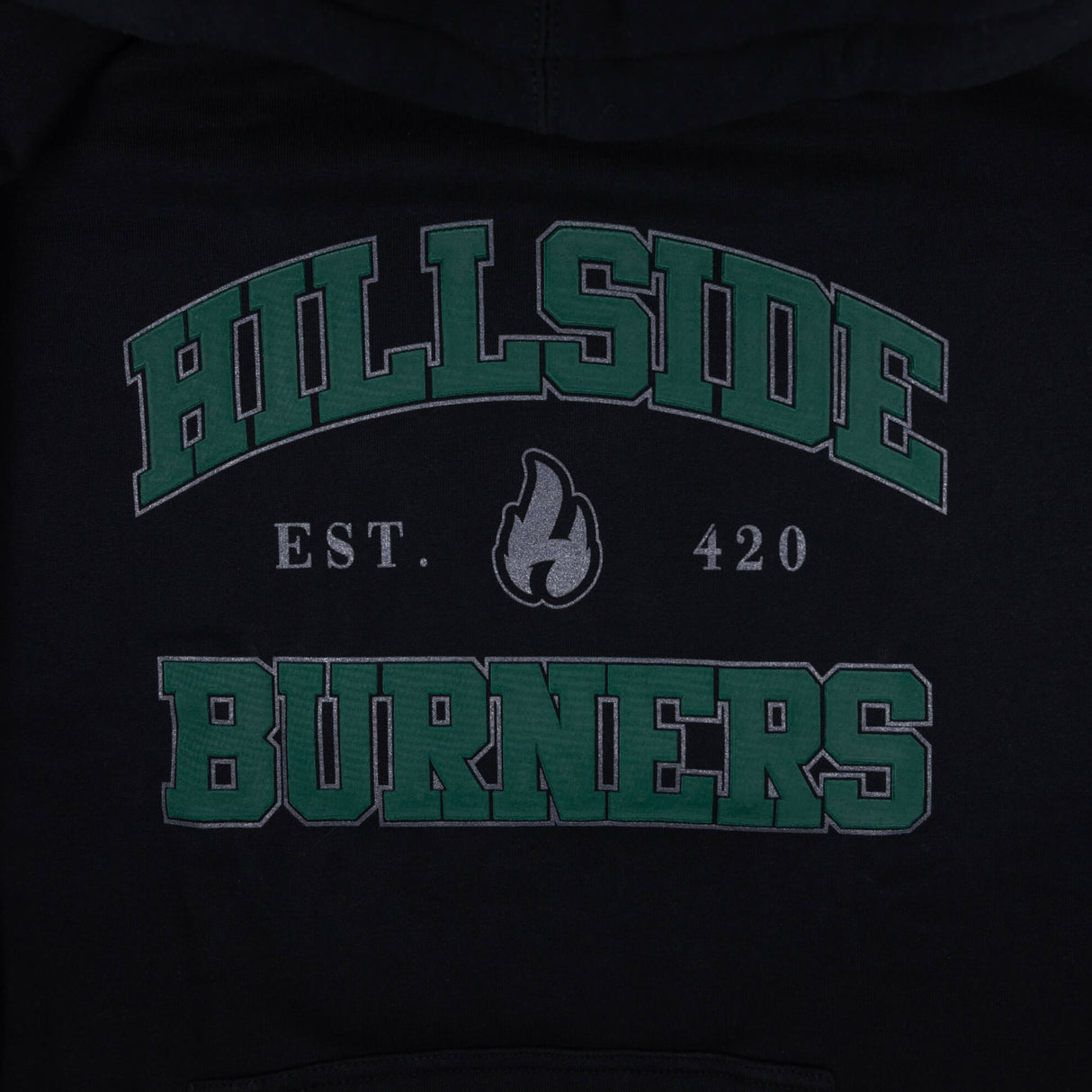 Black varsity hoodie back graphic with green arched text and flame icon