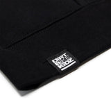 Black hoodie cuff close-up with woven brand label on sleeve hem.