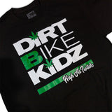 Black kids graphic T-shirt close-up of "Dirt Bike Kidz" text with green leaf icons