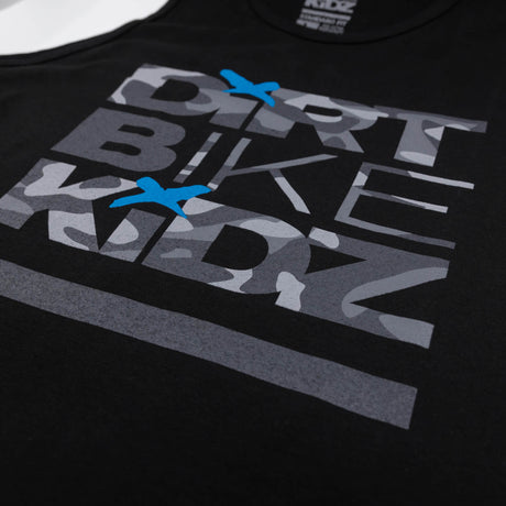 Black kids tank top close-up of Dirt Bike Kidz camo text with blue accent stars.