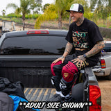 Black youth premium tee worn by rider; front shows camo Dirt Bike graphic