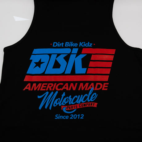 Black tank top close-up with Dirt Bike Kidz and DBK logo.