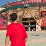 Red tall tee back view with crew neck and short sleeves
