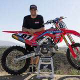 Black T-shirt worn by a person, with DBK Dirt Bike Kidz logo on the chest