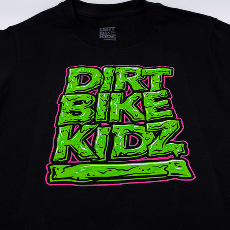 Youth black T-shirt close-up with DIRT BIKE KIDZ neon green graphic