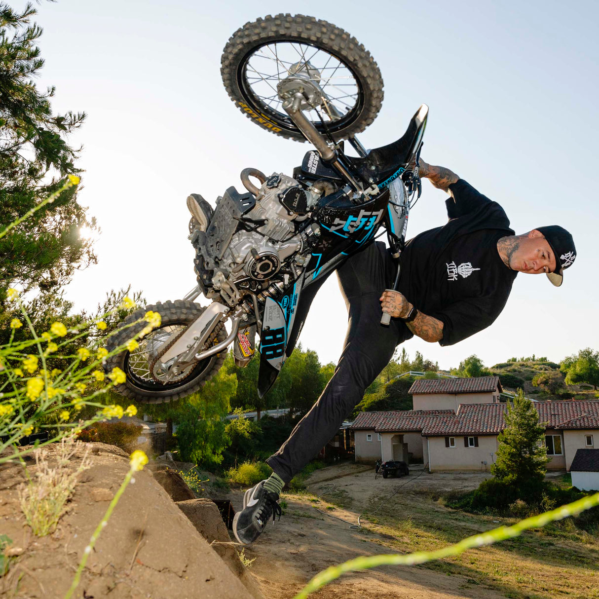 Black FU Tee worn by rider, with small chest logo print.