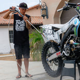 Black mens tank top with "Fuck your Vibes" graphic, worn by a person