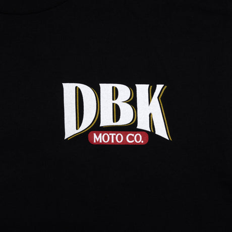 DBK Premium Tall Tee, black, close-up of DBK Moto Co. chest mark