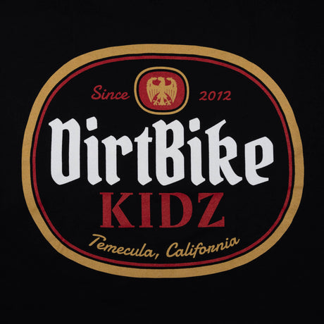 Premium tall tee logo close-up, black fabric with DirtBike KIDZ oval graphic