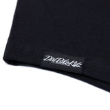 Black tall tee fabric hem with stitched brand tag.