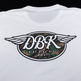 White tall tee with large winged DBK emblem featuring camo-style center graphic