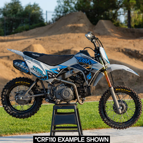 Kawasaki KLX 110/65 off-road motorcycle with blue Hillside Burners side graphics