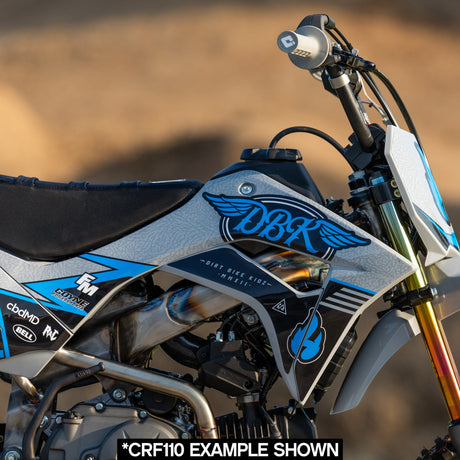 Blue Hillside Burners tank and side shroud decals close-up on Kawasaki KLX 110