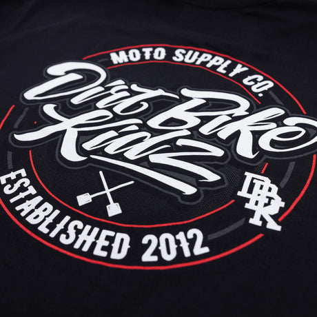 Black tee front graphic with Moto Supply logo and 'Established 2012'