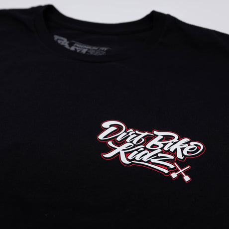Close-up of red and white logo print on black tall tee chest