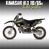 Kawasaki KLX 110 dirt bike with black and yellow faded graphic decals, off-road wheels