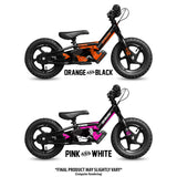 Signature Series balance bikes in orange/black and pink/white, side views with saddle
