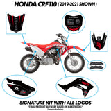 Red and white pit bike with black seat graphics and outlined decal locations