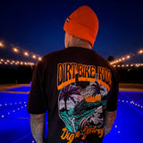 Rust orange beanie on wearer with ribbed cuff and small black brand patch
