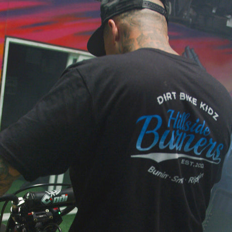 Black T-shirt worn from behind with Hillside Burners back graphic and Dirt Bike Kidz