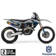 Blue and gray motocross motorcycle with side panel, fender, and engine graphics