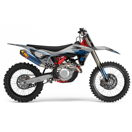 GasGas Hillside Burners side view with red frame accents, blue/gray fairing graphics