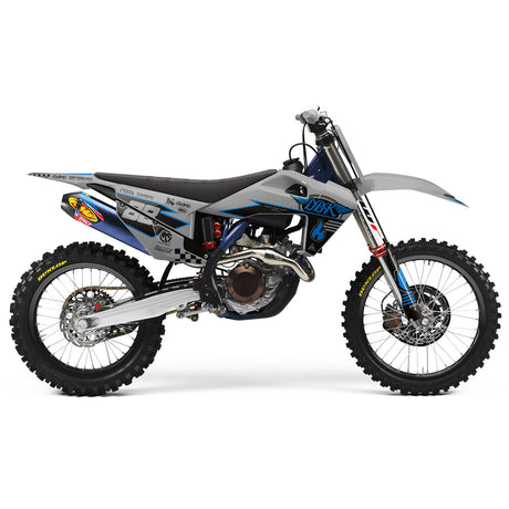 Off-road dirt bike Husky with blue/gray body graphics, knobby tires, and front fork