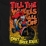 Youth black T-shirt close-up with red helmet skull rider graphic and “Dirt Bike Kidz”